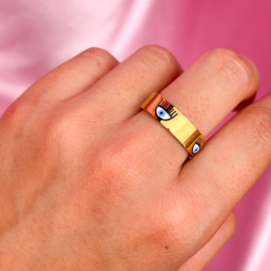 Anillo de banda ancha con ojos turcos
