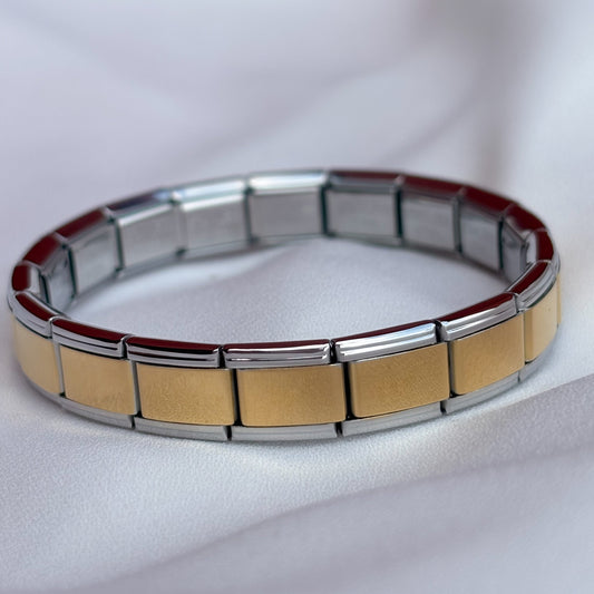 Pulsera italiana bicolor dorada con vivos plata