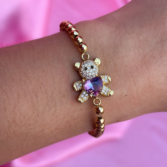 Pulsera de bolitas osito corazón dorada